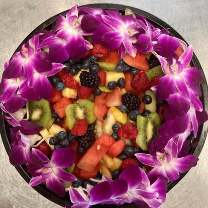 Fresh fruit tray with orchids