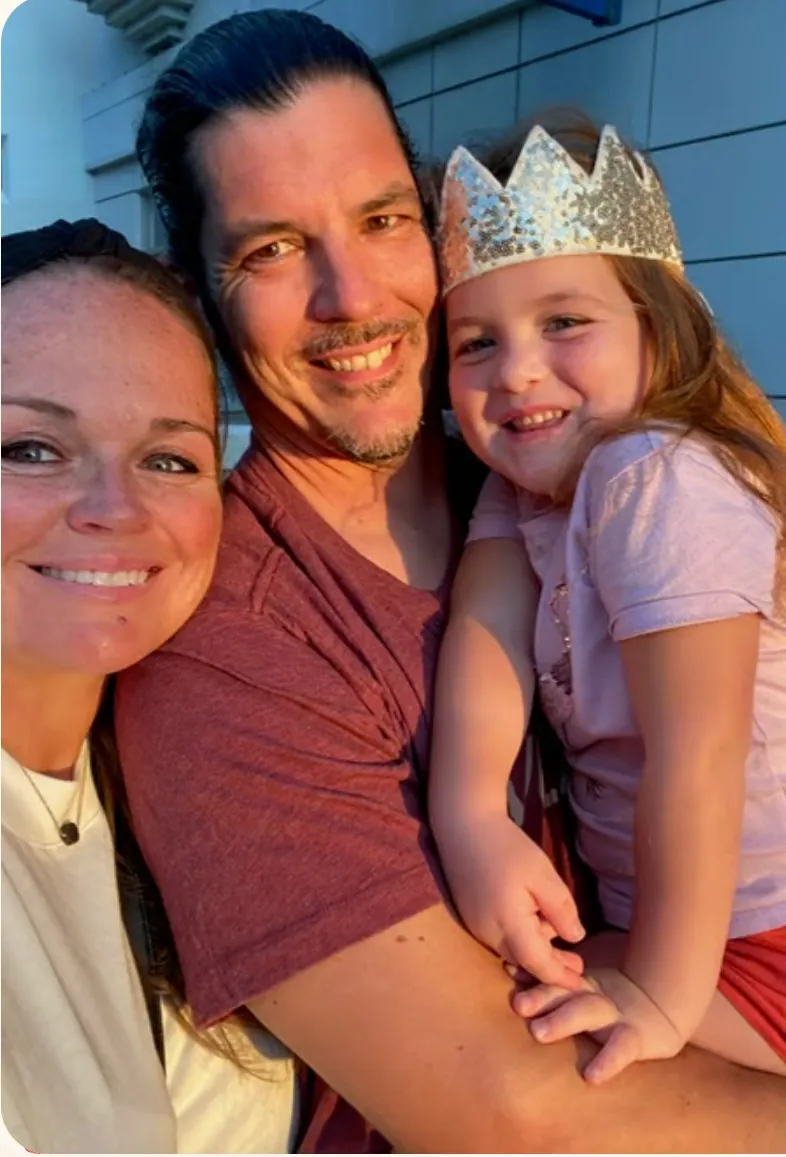 Jessica Iannuzzi and Stephen Koste with their daughter