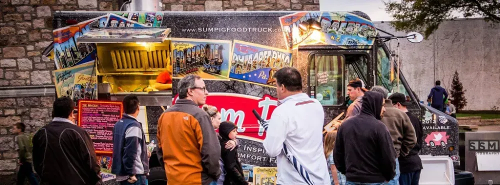 Customers lined up at the Sum Pig food truck