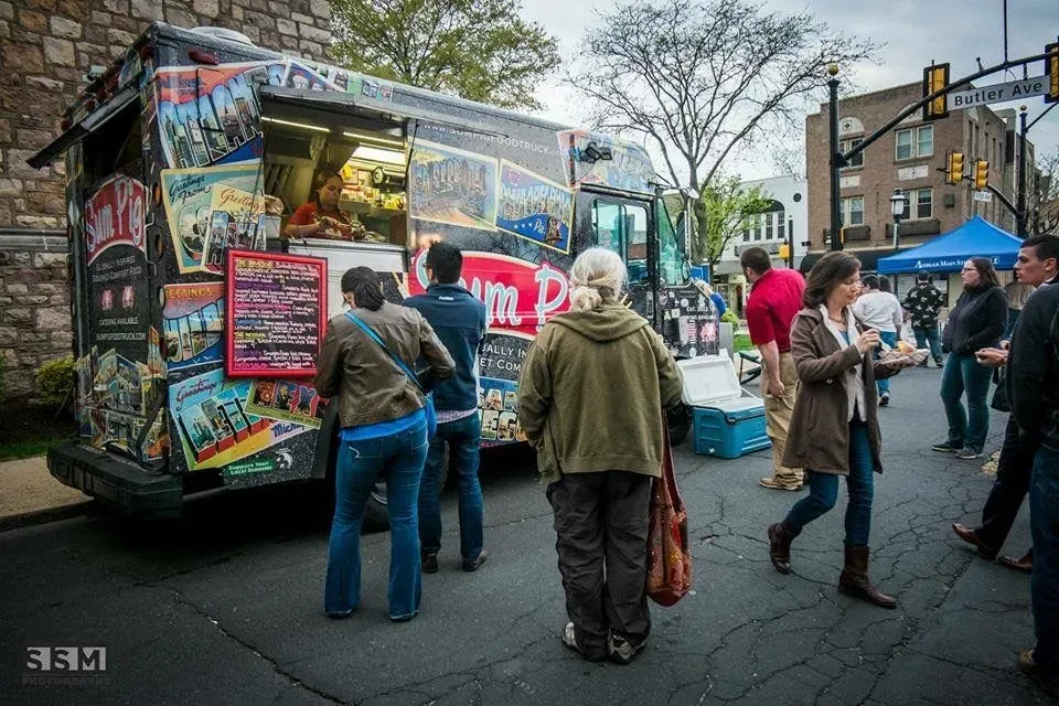 The Sum Pig food truck at a street festival