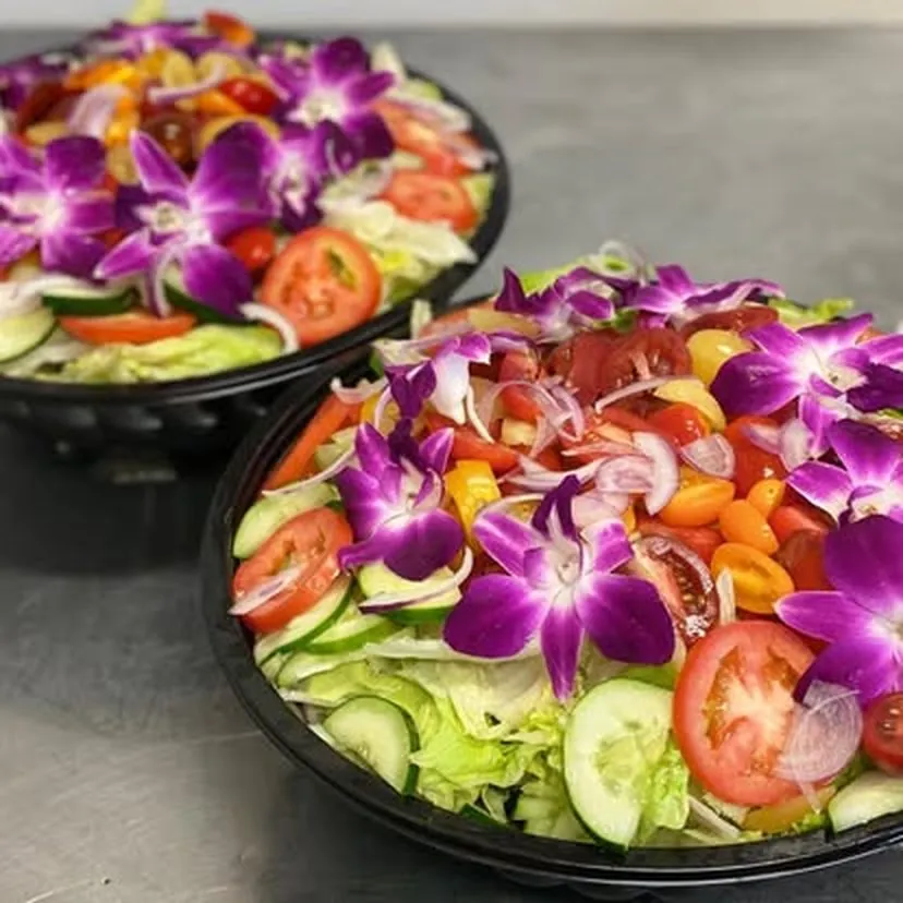 Sum Pig house garden salad with edible flowers